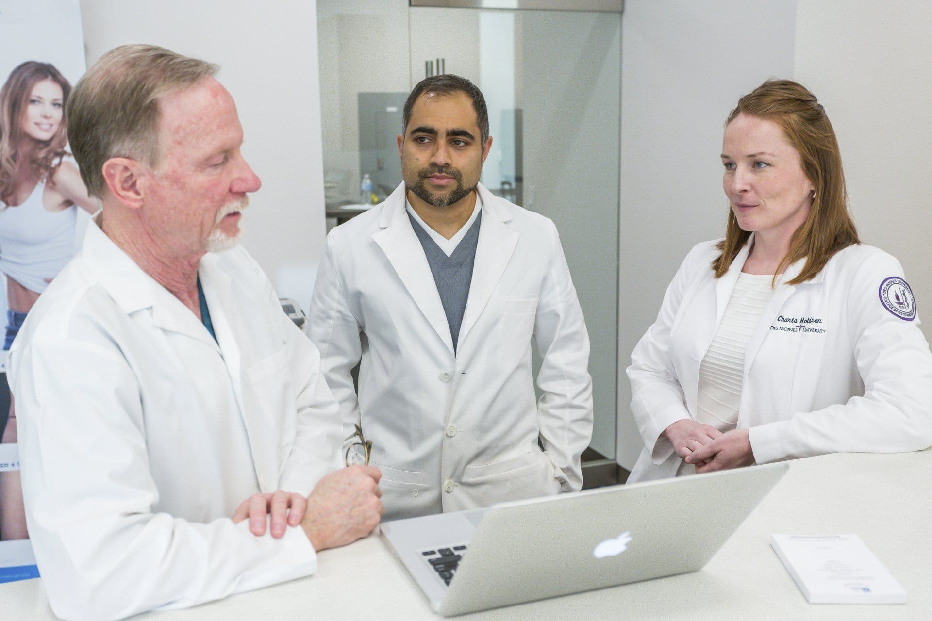 Medical providers collaborating at The Urology Place